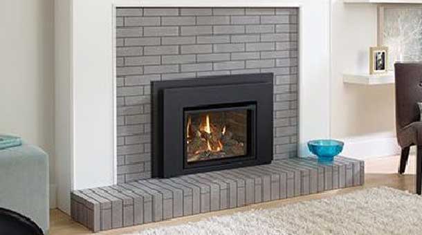 Regency L234 Gas Fireplace Insert with gray brick surround